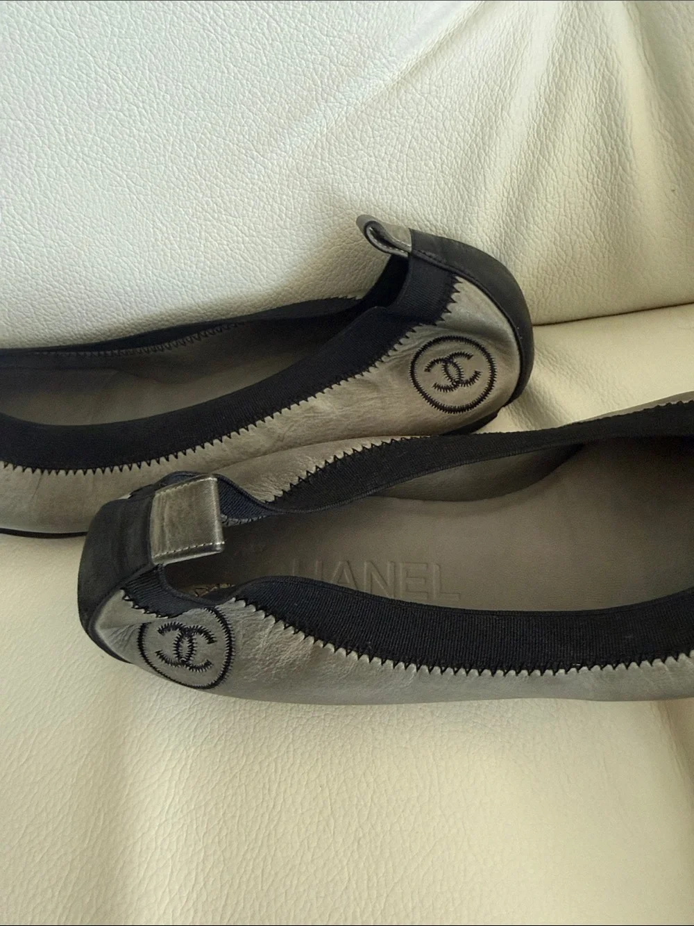 CHANEL Leather Gary and Black Cap-Toe Ballet FlatsToe Ballet Flats